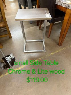 Small Side Table Chrome and Light Wood We are located at 2811 East Bell road. Another Time Around Furniture.