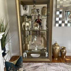 Gold curio cabinet 