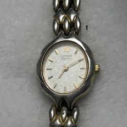 vintage Citizen Quartz women's watch featuring a distinctively sculpted two-tone silver and gold link bracelet