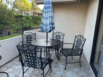 Wrought iron table and chairs