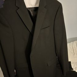 Lot Of Suits And Jackets And Shirts