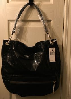 OrYany patent leather hobo with dust bag.