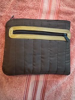 Quilted brown fabric pouch
