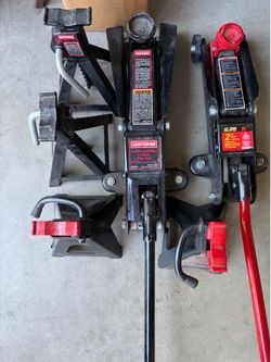 2 hydraulic jacks and stands