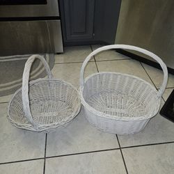 2 WHITE WICKER BASKETS $10 EACH