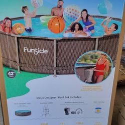 14'x42" Swimming Pool with Filter, Pump, Ladder. 