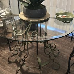 48” round glass table sage  green rod iron base great condition  pk up Everett Mall  Way