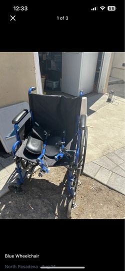 Blue Folding Wheelchair with Footrests