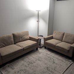 Tan couch and loveseat set
