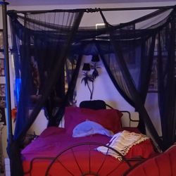 Canopy bed frame with drapes