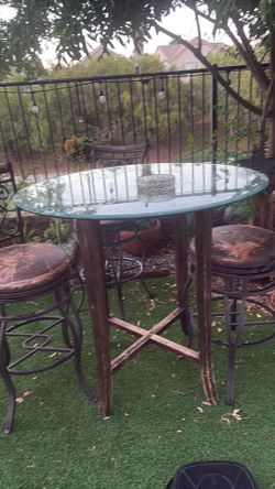 Tall table with iron chairs