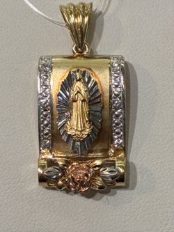 Religious pendant 14k 7.1 grms
