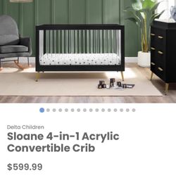 DELTA CRIB; Sloane 4-in-1 Acrylic Crib ($500) 