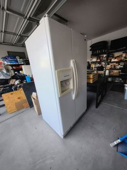 White Side-by-Side Refrigerator with Ice and Water Dispenser