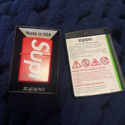 SUPREME ZIPPO RED
