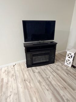 Electric fire place entertainment center
