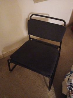Medium sized black chair. Great for watching TV.
