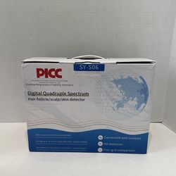 Digital Quadruple Spectrum Hair Follicle/Scalp/Skin Detector, a device used for professional scalp and skin analysis