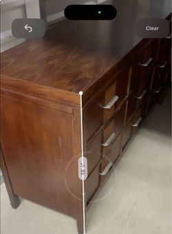 Dark Wood Dresser with Multiple Drawers