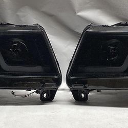 Pick up or ship  Se habla espanol.  In stock - guaranteed to fit  Open to trades  11-13 Jeep Grand Cherokee headlights Led faros focos luces 