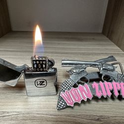 Vintage WORKING Von Zipper belt buckle lighter from early 2000s. Heavy pewter buckle with crossed.