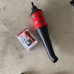 Troy Bilt Jump starter And Blower Attachment