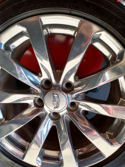 Cadillac chrome rims on michelline run flat tores