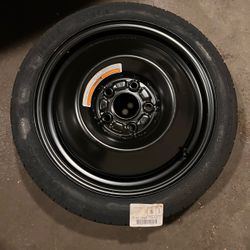 Nissan Altima spare tire and 2 cover cups