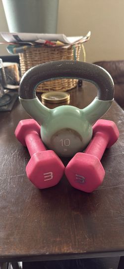 10 pound kettle bell and a set of two each 3 pound dumbbells
