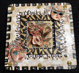 Petite And Exotic flowers embellished hand made accents of clay masks by artist Leslie Naveh
