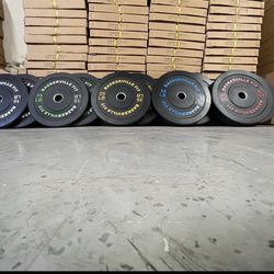 NEW 260lb set of Olympic Bumper Plates sealed in the manufacturer box  