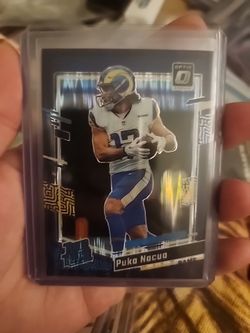 2023-24 Donruss Optic Puka Nacua Purple Shock Prizm Rated Rookie No. 238 Rams