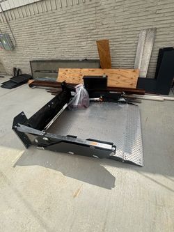 Tommy gate hydraulic lift