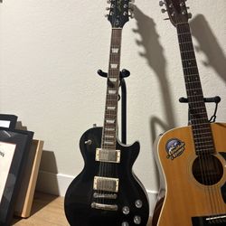 Epiphone Les Paul electric Guitar (with Case + Amp)