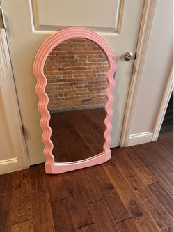 Pink wavy mirror