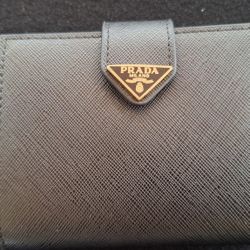 PRADA Bifold Wallet New In Box retails $725.00