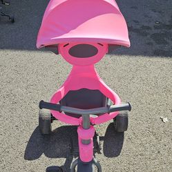 Pink tricycle