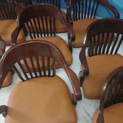 banker's chair, courthouse chair, or jury chair These chairs were popular in professional and judicial settings