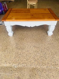 Ashley Furniture traditional carved-wood coffee table.