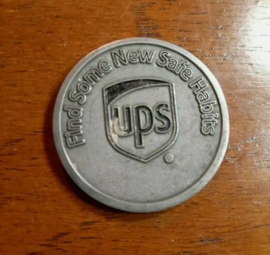 Vintage UPS Move It Tag. Unique and Hard To Find Collectible Token Coin. I bundle so please check out my other tokens, coins, and numerous items lis