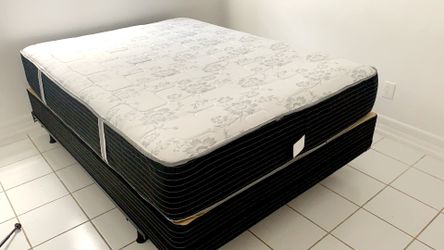 New queen mattress and box spring 2 pc bed frame is not included