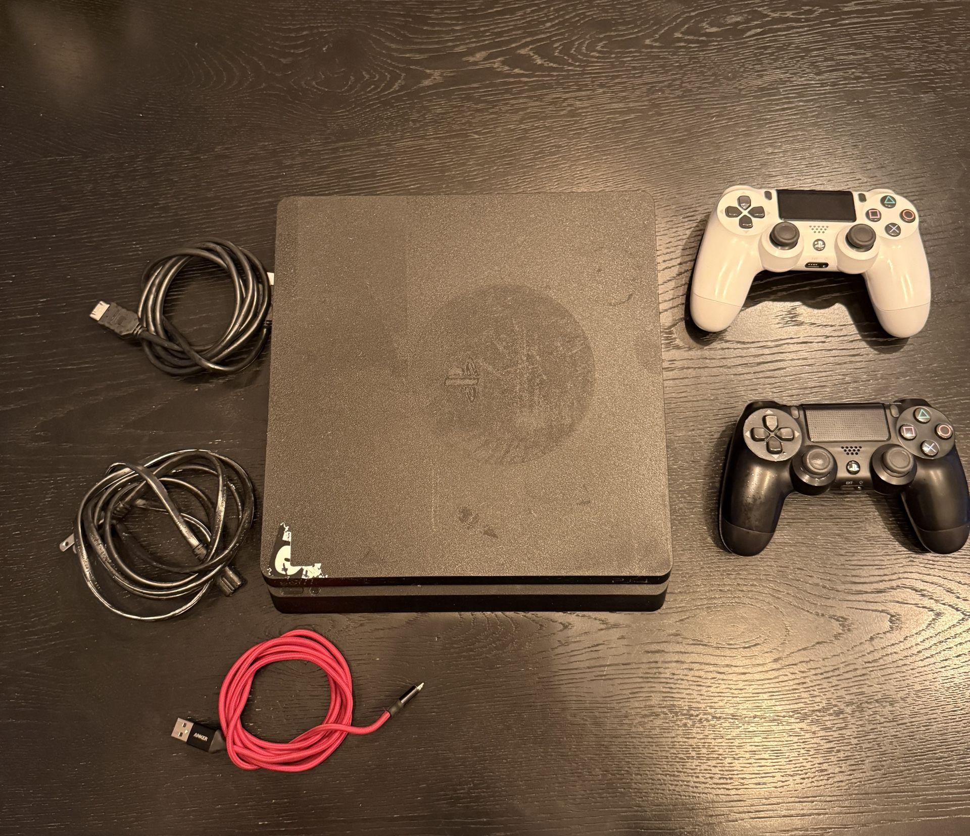 Playstation 4 with 2 controllers, hdmi, power cable and charger