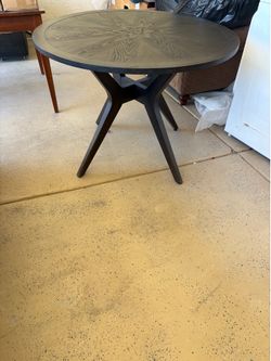 Circular wooden table