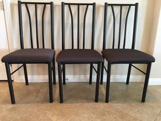 3 - Metal cushioned chairs