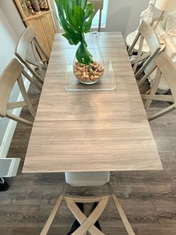 6 seater light grey dinning table with storage
