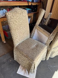Set of 4 skirted high-back upholstered dining chairs