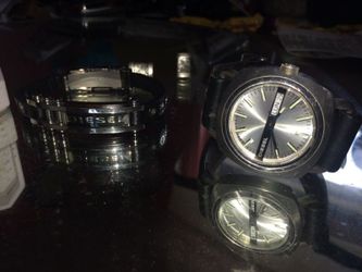 Diesel watch and silver/ black leather bracelet