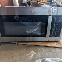 GE Over The Range Microwave (Dented)