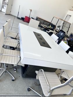 Large conference table with chairs