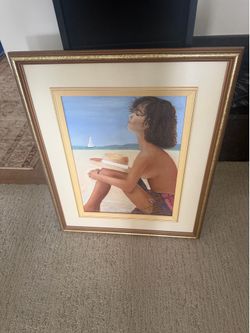 Girl on beach painting framed